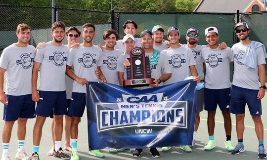 The founders and team winning CAA championship