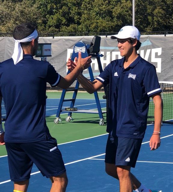 Team Members shaking hands